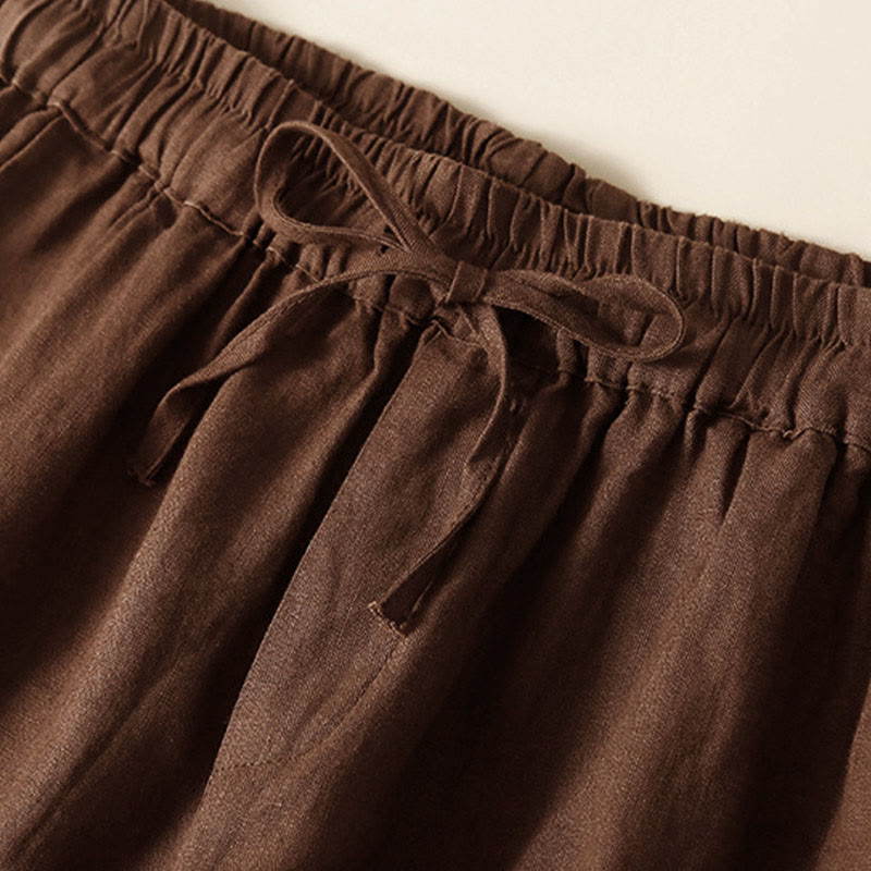 Relaxed Drawstring Shorts with Elegant Lace-Trimmed Hem