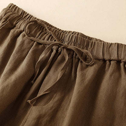 Relaxed Drawstring Shorts with Elegant Lace-Trimmed Hem