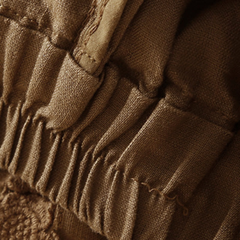 Relaxed Drawstring Shorts with Elegant Lace-Trimmed Hem