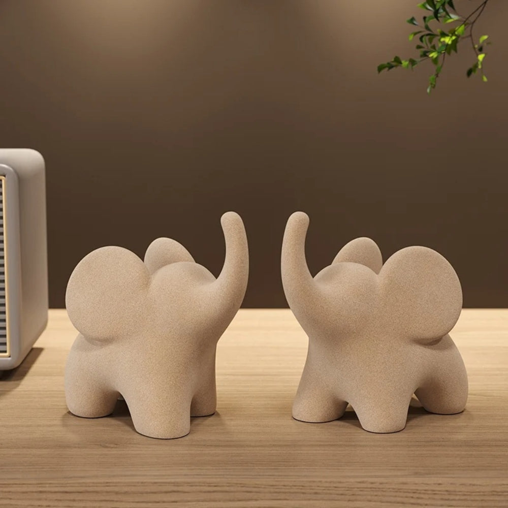 Modern Resin Elephant Figurine With Uplifted Trunk