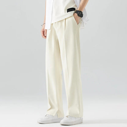 Theodore Relaxed Fit Trousers | Pleated Split Hem Trousers