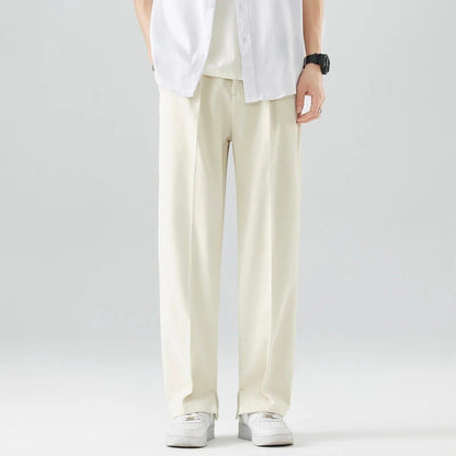 Theodore Relaxed Fit Trousers | Pleated Split Hem Trousers