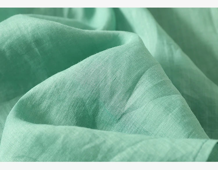 Relaxed Embroidered V-Neck Blouse with Artisan Detailing