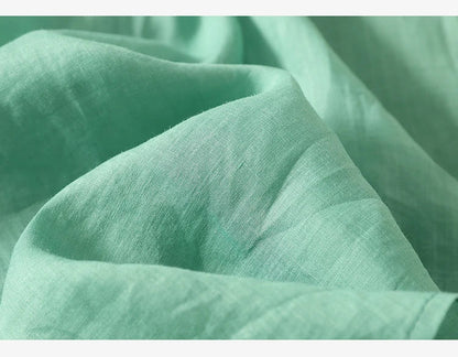 Relaxed Embroidered V-Neck Blouse with Artisan Detailing